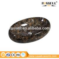 Top sale bathroom countertop oval black marble wash basin in china